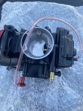 1310860301 Pucky Red And Black Carburetor
