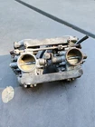 76 Kawasaki Carburetor Set Used. Price: $237.49.