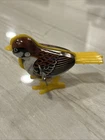 Antique Mikuni 1950 Hopping Tin Brow Bird Mechanical Wind Up Toy Works Used. Price: $14.99.