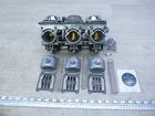 1980 Yamaha XS850 Triple Y21115) Hitachi Carburetors Carbs Set Used. Price: $345.00.