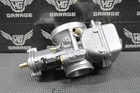 2003 Honda CR125R Oem Mikuni Tmx 38MM Carburetor Body 16100-KZ4-L32 Used. Price: $229.99.