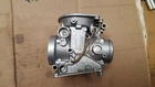 94-97 Suzuki Outer Right Carburetor Body #4 Code 31E1 Nice! Used. Price: $52.00.