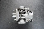 Yamaha XV920 Virago Left Side Carburetor Housing Empty Body Used. Price: $85.00.