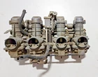 Carburetor Rack Mikuni P8 1977-1979 Kawasaki KZ650C 78 Used. Price: $149.99.