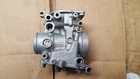 01-06 Suzuki Katana Outer Left Carburetor Body # Mikuni 19E3 Used. Price: $45.00.