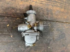 1976 1977 Yamaha Carburetor Body Mikuni 1J0 Used. Price: $125.00.