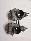 Suzuki GT250 Hustler Carburetors Fits 1973 Used. Price: $154.00.