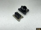 98-08 Ktm Sx Mini Intake Reed Block Manifold Assembly 45130050000 46030051144 Used. Price: $35.00.