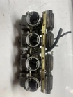 1983 Suzuki GS750E Oem Complete Carburetor Rack Assembly Carbs Used. Price: $319.99.