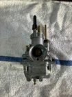 1976-1986 Kawasaki KE100 KM100 Oem Mikuni Carburetor 16001-1185 Used. Price: $140.00.