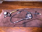 1974 - 1977 Suzuki Front Brake Assembly Caliper Master Cylinder. Price: $129.00.