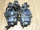 84 85 Honda Oem Dual Carburetors Parts Housing Bowl Valve Used. Price: $135.96.