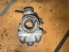 75 Yamaha RD-350 Oem Left Carburetor, 360-14101-60-00 Used. Price: $50.00.